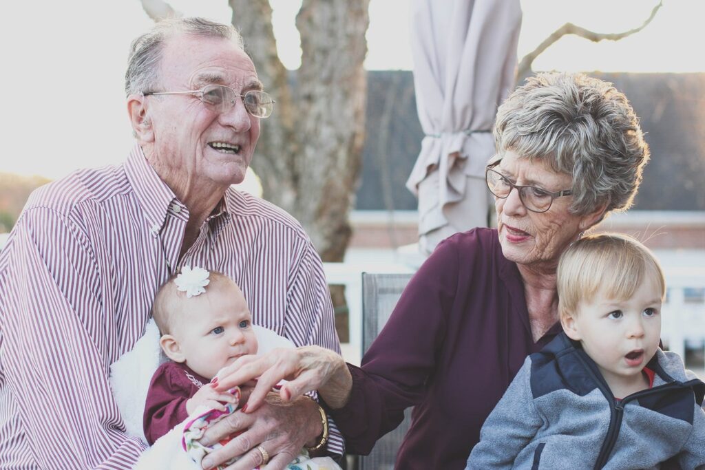senior citizens, with grandchildren