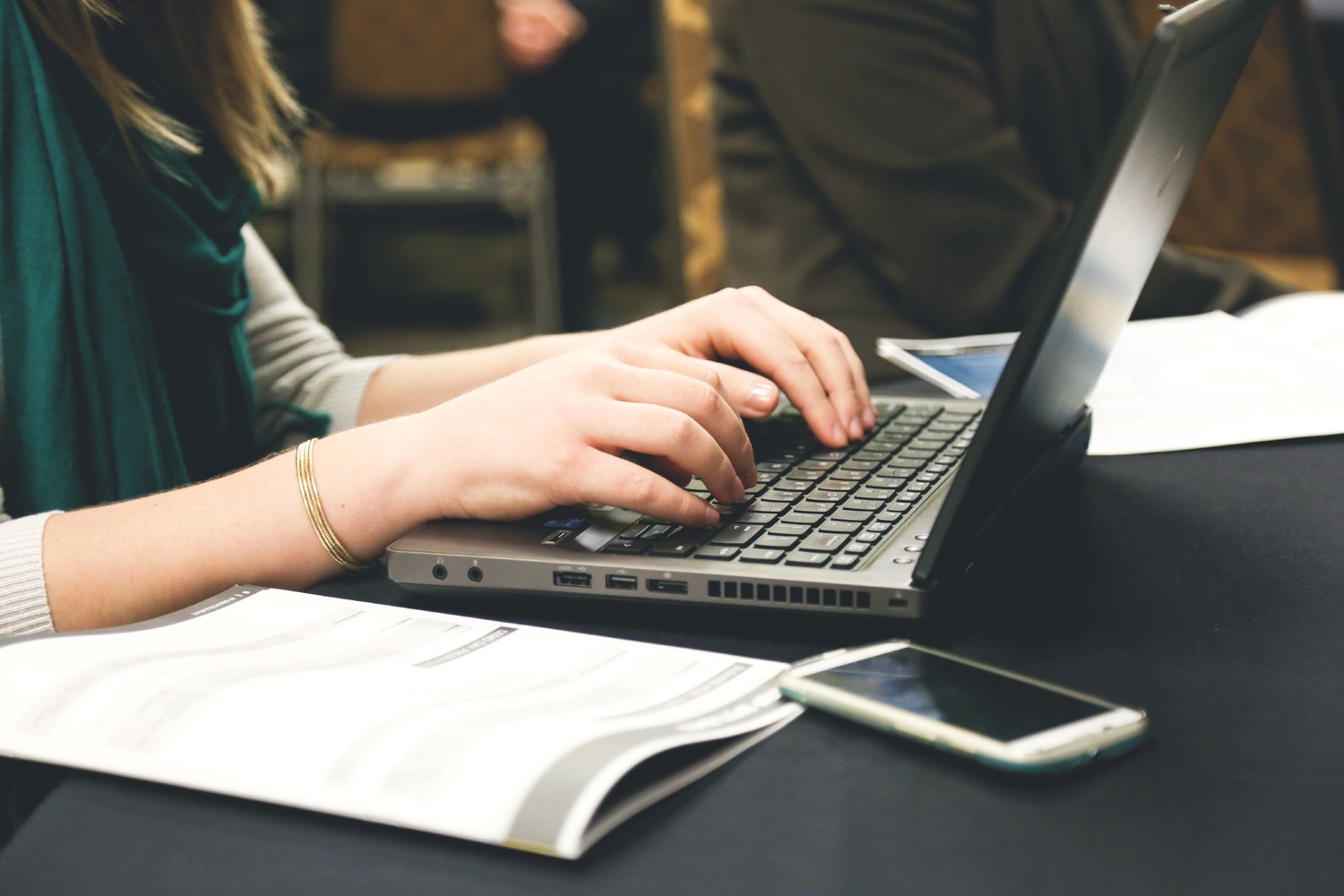 Woman searching online using her laptop