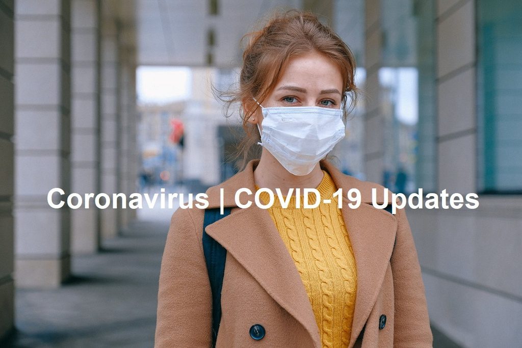 Coronavirus updates: Woman with surgical mask (by Anna Shvets)